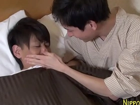 Young Japanese man gives a blowjob to a twink