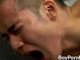 Young Japanese hunk Yoshi Kawasaki gets a hardcore doggy style fuck and then cums hard.