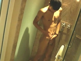 A gay shower scene with an Asian twink and a hung stud