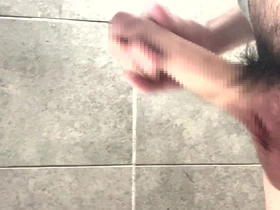 Young Japanese man pleasures himself with his impressive large penis