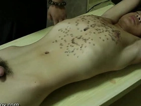 Muscular Asian man endures hot wax play in BDSM scene