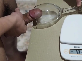 Solo Japanese guy masturbates into the glass